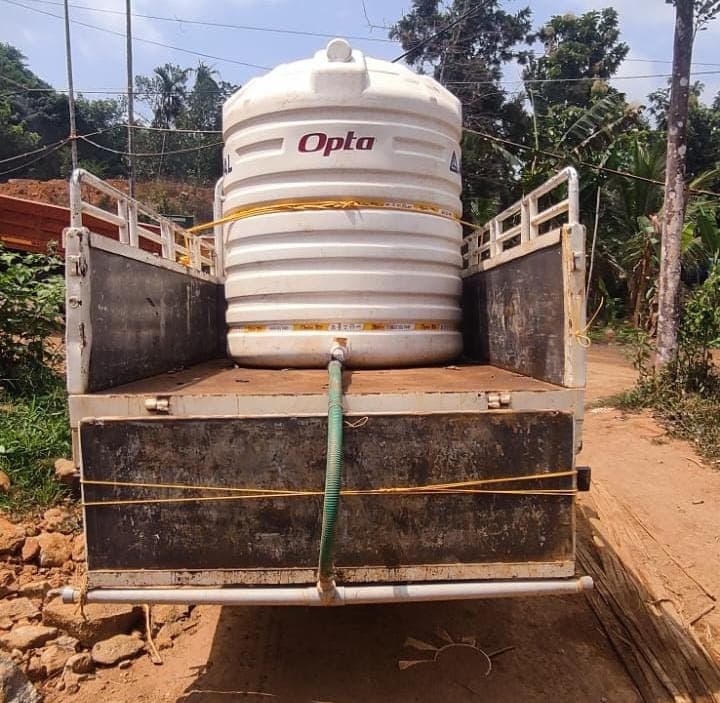 Watering Road Using Watering Vehicle